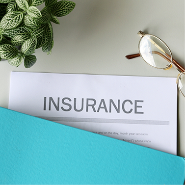 Insurance form peeking out of folder