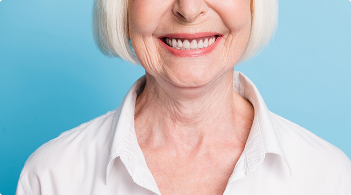Close-up of senior woman smiling