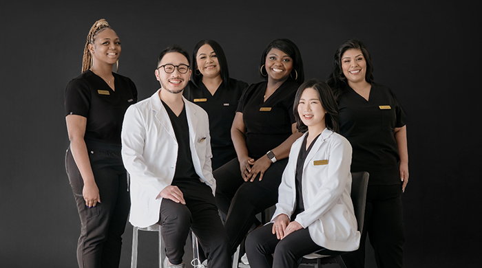 Lancaster dentists and team members smiling